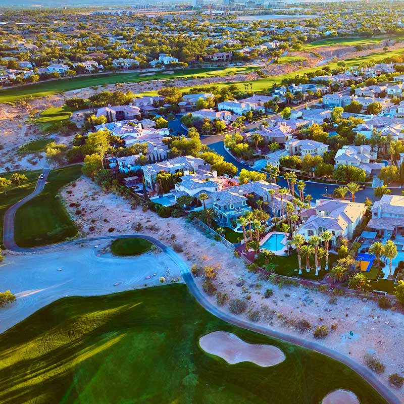 Aerial view of master‑planned community with golf course in Henderson, Nevada – Henderson real estate market 2025