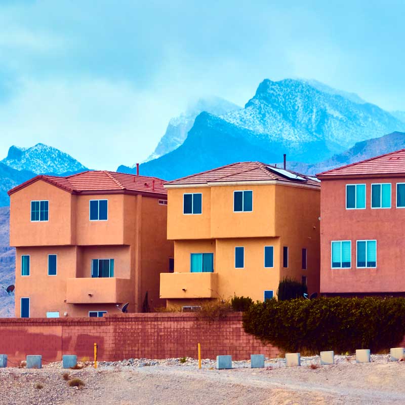 Colorful desert townhomes with mountain backdrop in Nevada – Las Vegas economic drivers 2025
