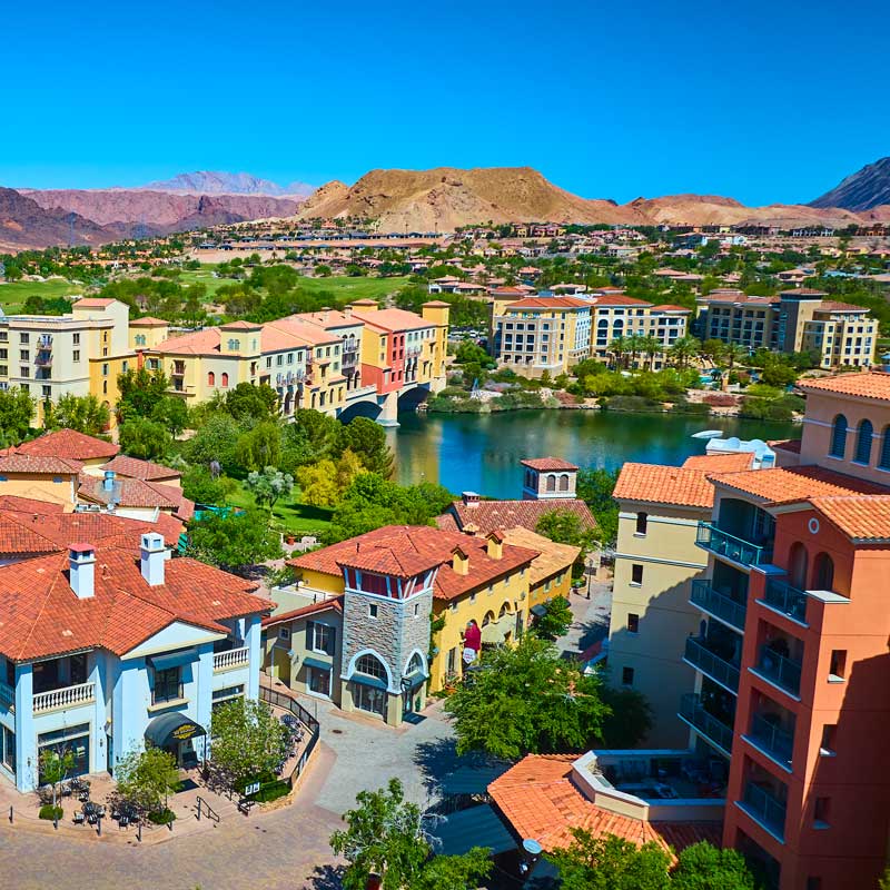 Colorful waterfront villas at Lake Las Vegas with desert mountains – Nevada hard money rates by experience level