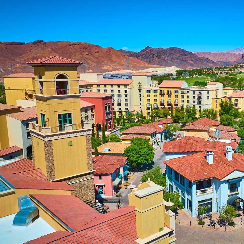 Lakeside resort buildings and terracotta rooftops in Las Vegas – regional Nevada hard money rate comparison